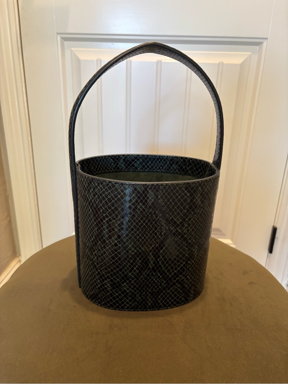 Staud Bisset bucket bag in green snakeskin print